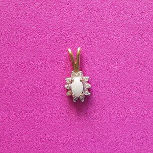 Dainty Opal and Diamond Pendant set in 10K Yellow Gold